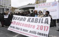 FILE: Members of Congolese associations calling Joseph Kabila to step down as President of the Democratic Republic of Congo, take part in a demonstration on 30 December 2017 in Brussels. Picture: AFP.