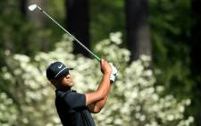 Tony Finau of the United States plays his second shot on the 11th hole during the first round of the 2018 Masters Tournament at Augusta National Golf Club on 5 April 2018 in Augusta, Georgia. Picture: AFP