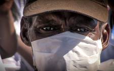 FILE: A man, wearing a mask, attends 2015 World TB Day march in Cape Town. Picture: Thomas Holder/EWN.