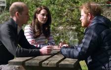 A screen grab of Prince William, his wife, Kate, and Prince Harry. Picture: CNN.