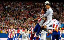 Real Madrid forward James Rodrigues leapss for the ball during the Champions League first leg quarterfinal againts Atletico Madrid on 14 April 2015. Picture: RealMadrid.com