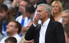 Manchester United's Portuguese manager Jose Mourinho gestures from the touchline during the English Premier League football match between Brighton and Hove Albion and Manchester United at the American Express Community Stadium in Brighton, southern England on 19 August 2018. Picture: AFP.