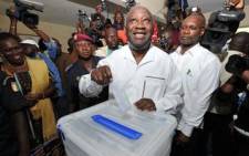 FILE: Former Ivory Coast President Laurent Gbagbo casts his vote on October 31, 2010 at a polling station in Abidjan. Picture: AFP