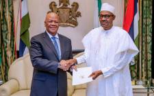 South Africa's special envoy Jeff Radebe meets Nigerian President Muhammadu Buhari on 16 September 2019. Picture: State House Abuja