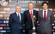 ICC Chief Exectuive David Richardson (L), tournament director Steve Elworthy (C) and England cricket captain Alistair Cook pose at the launch of the 2013 ICC Champions Trophy in London. Picture: AFP