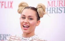 Miley Cyrus attends the ‘A Very Murray Christmas’ New York Premiere at Paris Theater on 2 December 2015 in New York City. Picture: Getty Images/AFP.