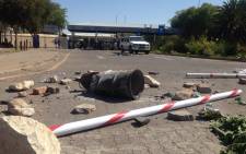 The North West University in Mahikeng Campus entrance has been barricaded on 22 October 2015. Picture: Mia Lindeque/EWN.