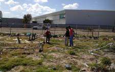 People invade a piece of land which belongs to Old Mutual in Marconi Beam near Milnerton. Picture: Regan Thaw/EWN