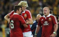 FILE: Players from the British and Irish Lions celebrate a win. Picture: AFP