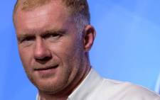 In this photo taken on August 8, 2018, former England and Manchester United football player Paul Scholes attends a promotional event in which he signed as Principal of the 433 Token cryptocurrency initiative in Hong Kong. Picture: AFP.