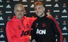 Manchester United manager Jose Mourinho and defender Luke Shaw. Picture: @ManUtd/Twitter.