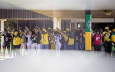 Members of the ANC sing and dance outside the plenary at the #ANC54 in Nasrec on 16 December 2017. Picture: Thomas Holder/EWN