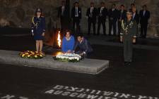 The President of the Philippines Rodrigo Duterte (R) and his daughter lay a wreath at the Hall of Remembrance on September 3, 2018 during his visit to the Yad Vashem Holocaust Memorial museum in Jerusalem commemorating the six million Jews killed by the German Nazis and their collaborators during World War II. Picture: AFP.