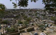 This picture taken on March 2, 2022, shows the Korangi graveyard in Karachi. In the teeming metropolis of Karachi, Pakistan's biggest city, graveyards are filling up and the dead are running out of space to rest. But for the right price to the right person, a plot can be "found" for the body of a loved one by shady crews who demolish old graves to make room for the new. Picture: Asif Hassan / AFP