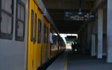 Two suspected robbers were stoned, beaten and tied to a train track to die by angry residents near Philippi.
