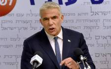 Israel's centrist opposition leader Yair Lapid delivers a statement to the press at the Knesset (Israeli parliament) in Jerusalem on 31 May 2021. Picture: Debbie Hill/AFP