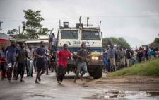 FILE: This file photo shows residents of Vuwani, escorted by police, during a demonstration to the municipal offices on 6 February 2017. Picture: Thomas Holder/EWN