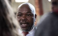 Mxolisi Nxasana speaks to the media after the Constitutional Court ruling on 13 August 2018. Picture: Kayleen Morgan/EWN