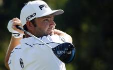 Andy Sullivan of England plays a shot during the first round of the 2015 Omega Dubai Desert Classic on 29 January, 2015 in Dubai, United Arab Emirates. Picture: AFP.