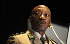 FILE: Tom Moyane, national commissioner of South Africa's Correctional Services speaks at the opening of a two-day colloquium on overcrowding in prisons. Picture: Werner Beukes/SAPA