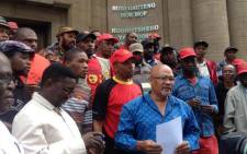 Numsa and other affiliates in support of Vavi address media outside the South Gauteng High Court ON 4 April 2014. Picture: Govan Whittles/EWN