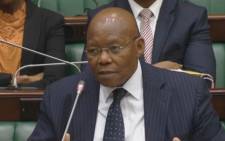 A screengrab of former SABC board chairperson Ben Ngubane answering questions in Parliament.