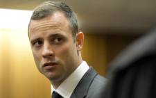 Oscar Pistorius during the first day of his murder trial in the Pretoria High Court on 3 March 2014. Picture: Pool