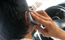 Talking on the phone while driving. Picture: freeimages.com