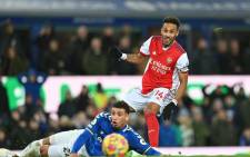 Arsenal striker Pierre-Emerick Aubameyang (R) misses a chance during the English Premier League football match between Everton and Arsenal at Goodison Park in Liverpool, north west England on 6 December 2021. Everton won the game 2-1. Picture: Paul Ellis/AFP
