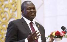 FILE: South Sudanese rebel leader Riek Machar speaks during the ceremony after the two South Sudanese arch-foes agreed in Khartoum on 27 June 2018 to a 'permanent' ceasefire to take effect within 72 hours in their country. Picture: AFP