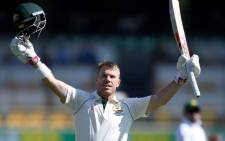 Australia's David Warner celebrates scoring 150 during day two of the first Test against Pakistan at the Gabba in Brisbane on 22 November 2019. Picture: @cricketcomau/Twitter