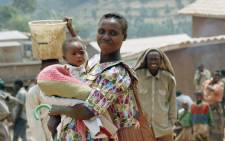 A mother and child in a camp in the French-protected area in Gikongoro, Rwanda. Picture: UN Photo.