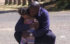 DA parliamentary leader Mmusi Maimane hugs a child in Eldorado park south of Johannesburg on 8 September 2014. Picture: Reinart Toerien/EWN