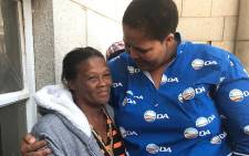 Elda Japhta's mom, Eva Lackay (L) being comforted by Zukiswa Tonisi, the deputy mayor of the Cape Agulhas Municipality, on 19 January 2018. Picture: Lauren Isaacs/EWN.