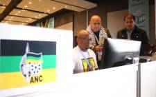 Western Cape ANC provincial secretary Faiz Jacobs and other ANC officials at the IEC results centre in Cape Town. Picture: Bertram Malgas/EWN.