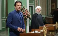 FILE: A handout picture provided by the Iranian Presidency on 13 October 2019 shows President Hassan Rouhani (R) and Pakistan's Prime Minister Imran Khan giving a joint press conference in the Iranian capital Tehran. Khan visited Iran following a request from the United States and Saudi Arabia for him to try to defuse rising tensions in the Gulf. Picture: AFP