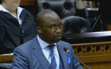 A YouTube screengrab of Justice Minister Michael Masutha in Parliament.