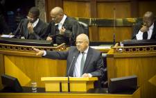 Minister of Cooperative Governance and Traditional Affairs Pravin Gordhan hit back at opposition arguing that their record isn't as spotless as they make it out to be. Picture: Thomas Holder/EWN