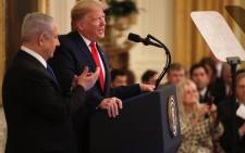 FILE: US President Donald Trump speaks during a press conference with Israeli Prime Minister Benjamin Netanyahu (L) in the East Room of the White House on 28 January 2020 in Washington, DC. Picture: AFP