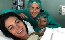 FILE: Cristiano Ronaldo (centre) seen with son Cristiano Junior (right) after the football star's girlfriend Georgina Rodriguez (left) gave birth to his fourth child Alana Martina. Picture: @Cristiano/Twitter
