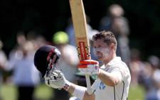 New Zealand's Henry Nicholls celebrates reaching his century (100 runs) during the day two of the first cricket Test match between New Zealand and South Africa at Hagley Oval in Christchurch on 18 February 2022. Picture: Marty MELVILLE/AFP