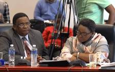 A screengrab shows Minister of Social Development Bathabile Dlamini (L) on the second day of the inquiry into the social grants crisis, on 23 January 2018.