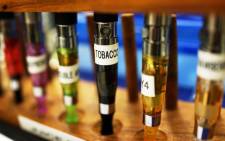 FILE: Electronic cigarette flavours for sale at an electronic cigarette store in New York City. Picture: AFP.