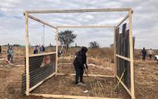 FILE: Residents build structures on land they've illegally occupied. Picture: Mia Lindeque/Eyewitness