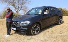Marketed as a cross between an SUV and a high-end coupe, the 2015 BMW X6 not only drives the part but looks the business too