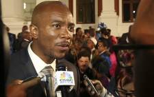 DA leader Mmusi Maimane speaks to journalists outside Parliament after the 2016 State of the Nation Address on 11 February 2016. Picture: Aletta Harrison/EWN