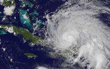 This GOES-13 satellite image saw Hurricane Irene approaching the Bahamas on August 23, 2011. Picture: AFP
