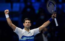 In this file photo taken on 17 November 2021, Serbia's Novak Djokovic celebrates after defeating Russia's Andrey Rublev during their first round singles match of the ATP Finals at the Pala Alpitour venue in Turin. Picture: Marco BERTORELLO/AFP