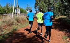 FILE: Marathon runners carry out a 'speed-work' along the back roads Iten, known colloquially as the 'world's running capital', legendary for producing some of Kenya's most elite athletes and a training ground for other international top distance runners on 9 May 2019. Picture: AFP