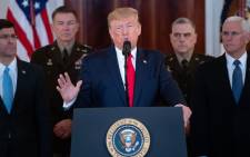 US President Donald Trump speaks about the situation with Iran in the Grand Foyer of the White House in Washington, DC, 8 January 2020. Picture: AFP